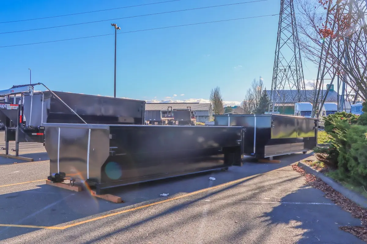 Roll-off dumpster ready for waste disposal at job site for Yard Waste Dumpster Rental in Logan